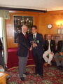 Stephen Butterfiels Somerset President Presents Robbie with the Trophy